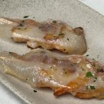 Gambas draperade med tunna skivor smältande panceta ibérica