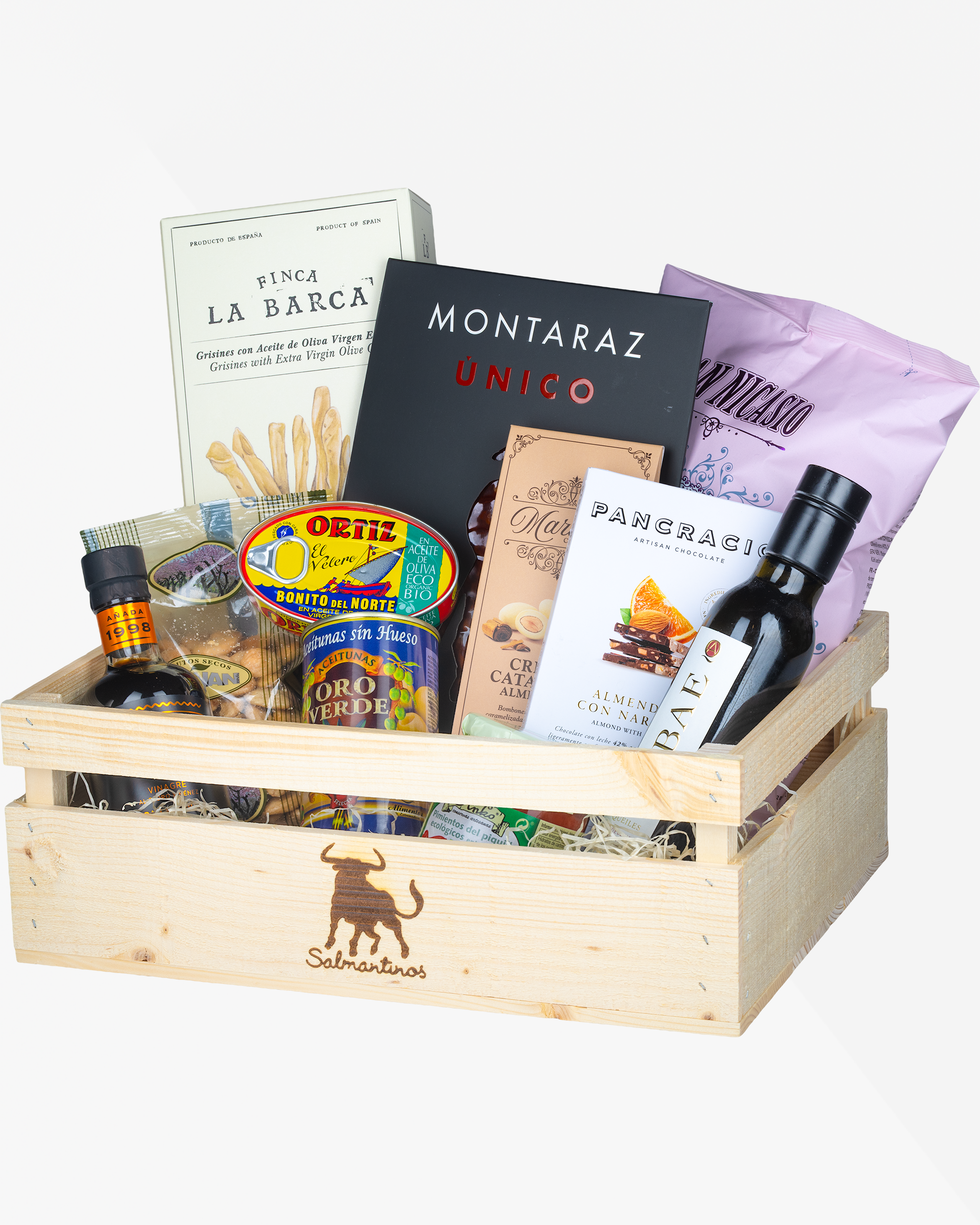 Nickes presentkorg: trälåda med träull och delikatesser från Montaraz, Ortiz, Pancracio, San Nicasio och Finca La Barca